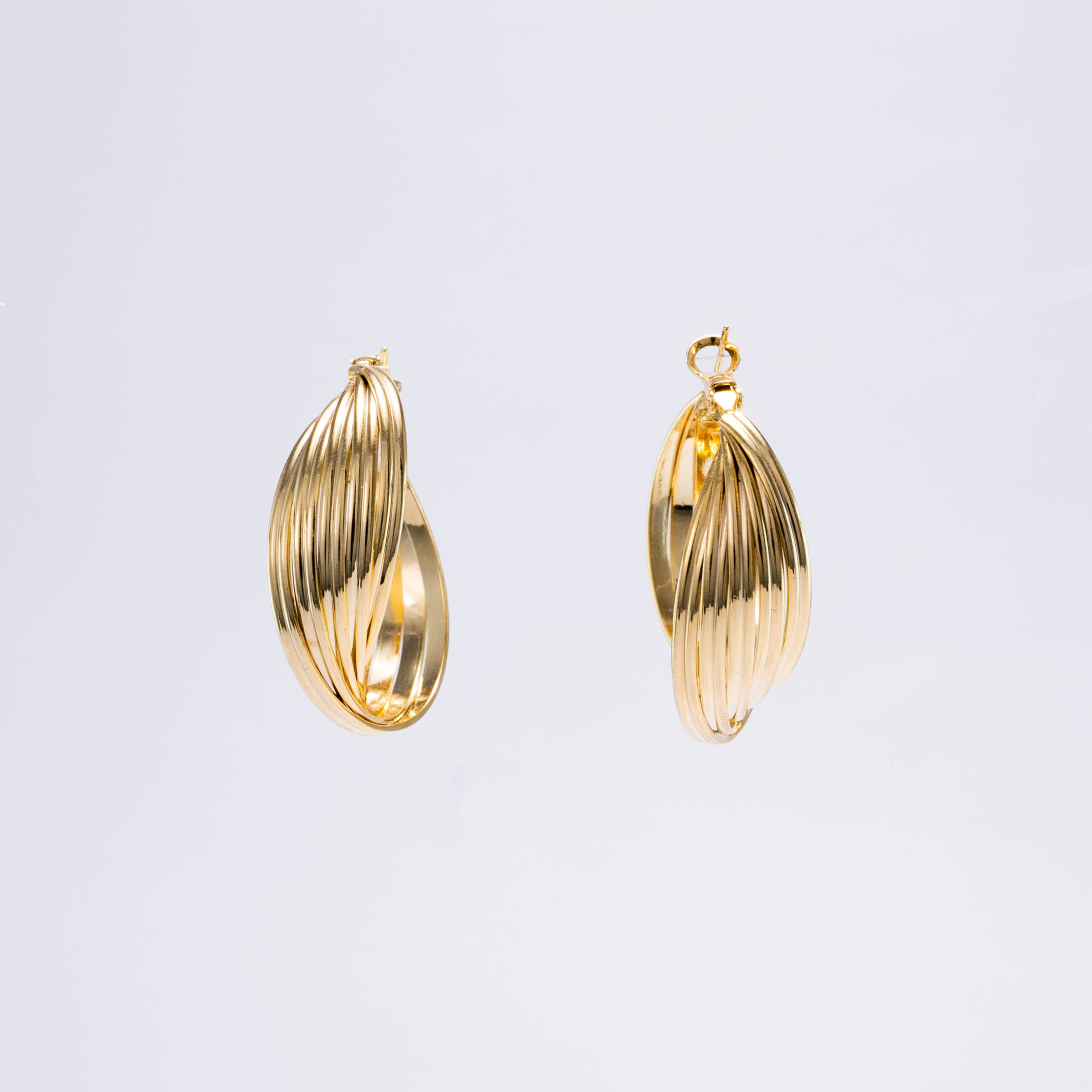 Pendientes Dorados Diseño Curvo