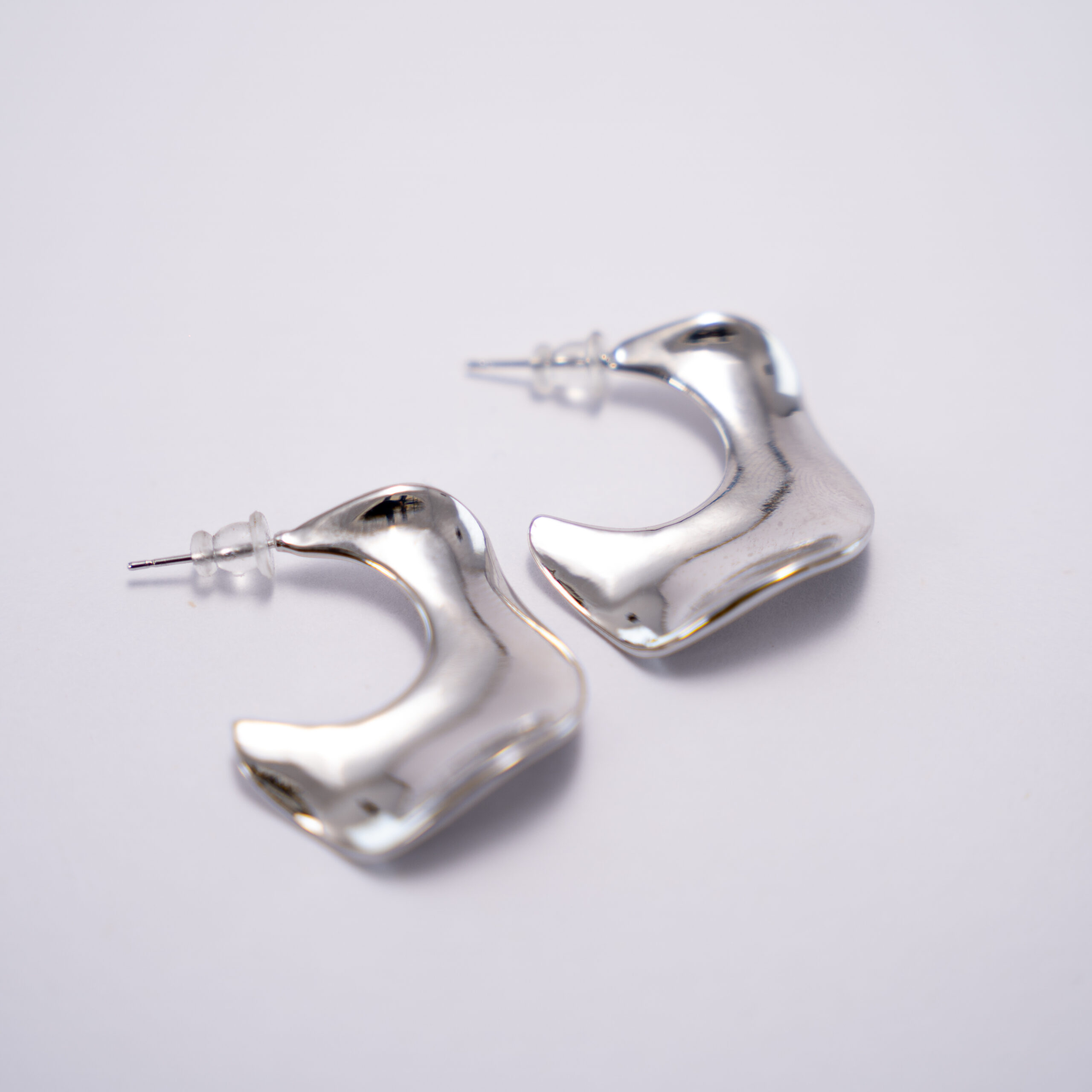 Aretes Irregulares Plateados