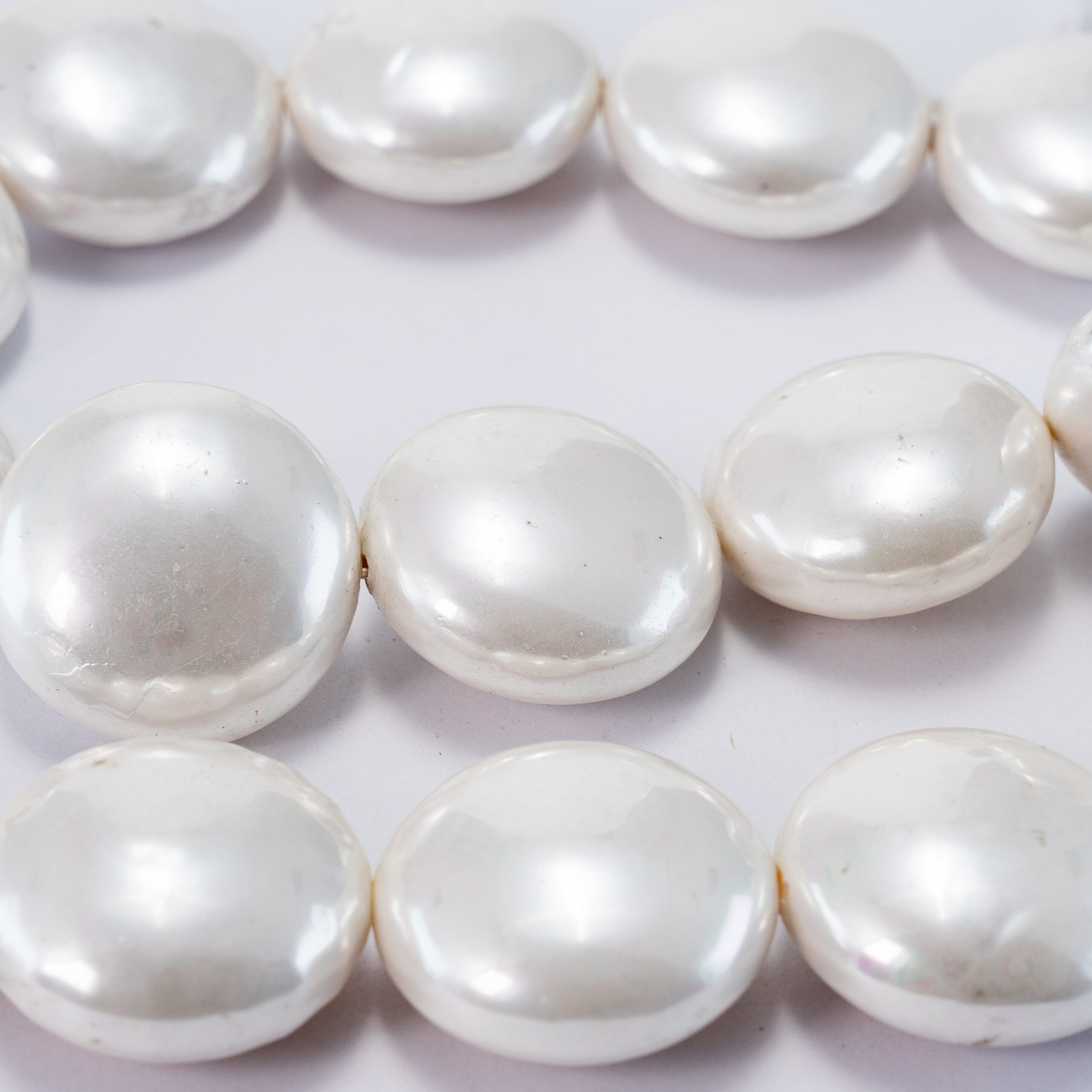 Sarta perla shell plana