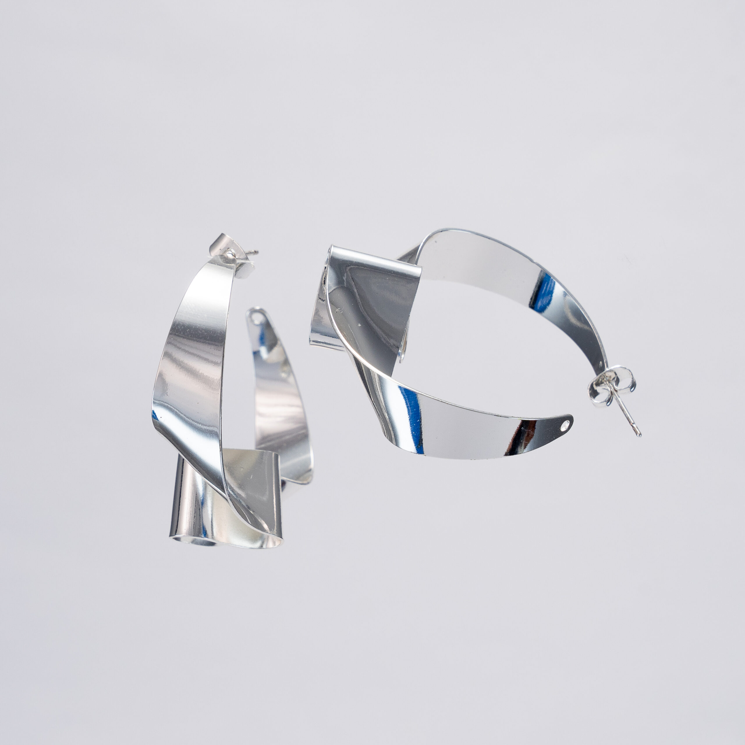 Aretes Reflejo Orbital Plateado